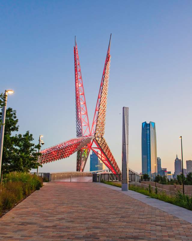 View of Skydance Bridge in Scissortail Park and the downtown skyline