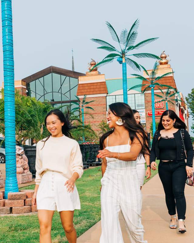 Group of women walking in the Asian District