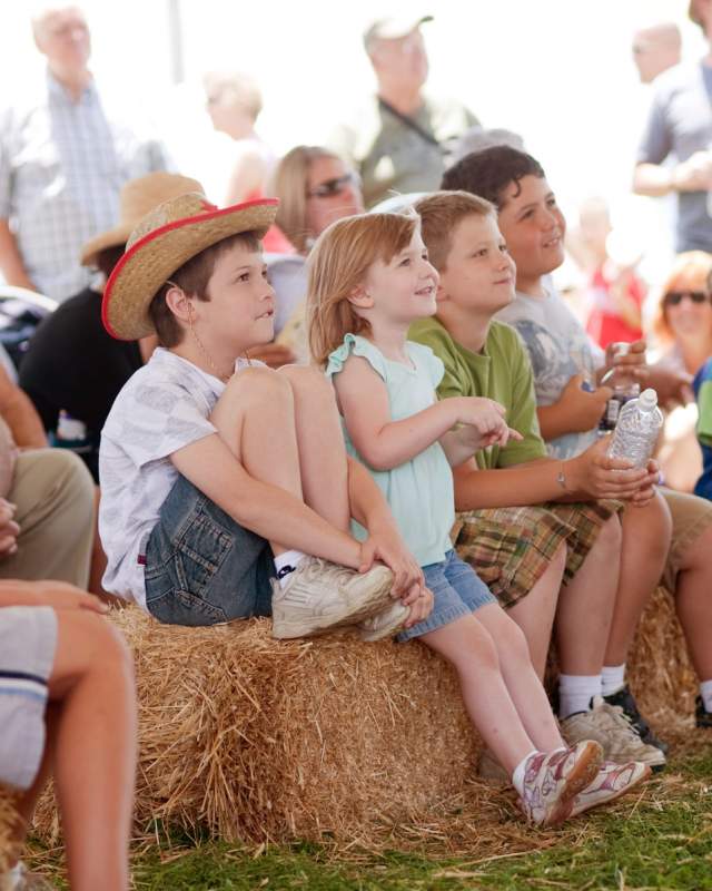 Children watch a show at the Kutztown Folk Festival