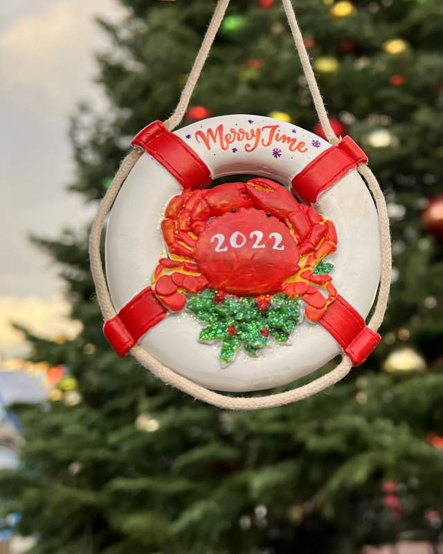 MerryTime crab ornament in front of Christmas Tree