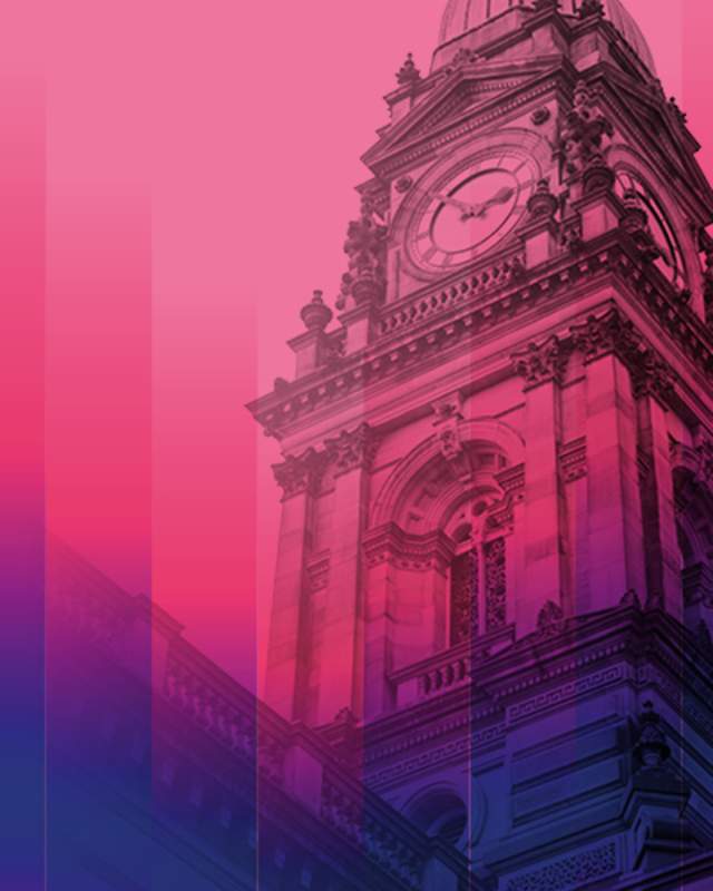 Purple and pink banner wih Manchester building