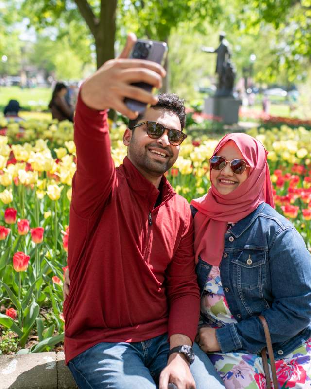 Couple taking selfie on phone at Centennial Park