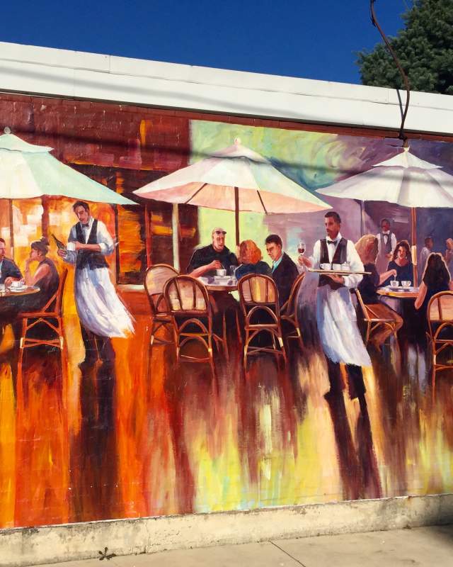 Art Mural in West Reading depicting an outdoor cafe with customers and waiters