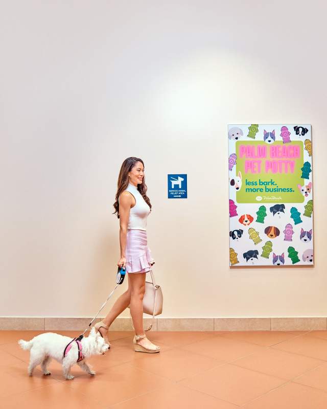 Couple walking inside the airport terminal.