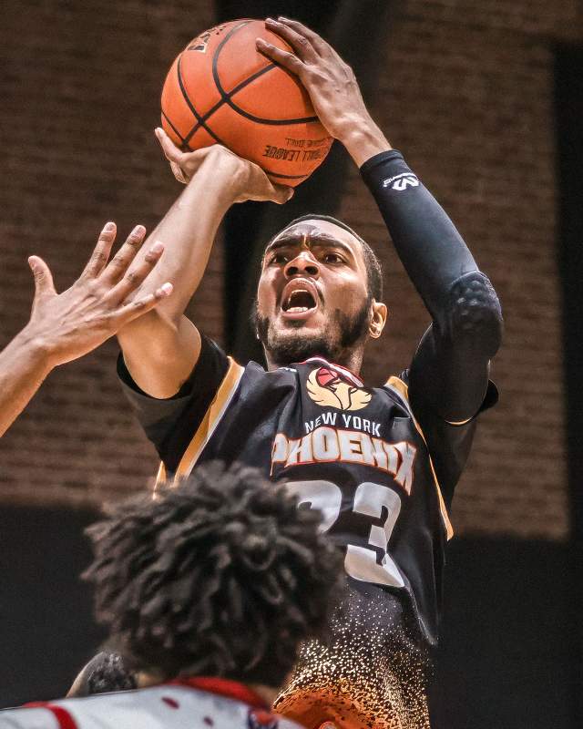 Phoenix player number 23 shooting basketball