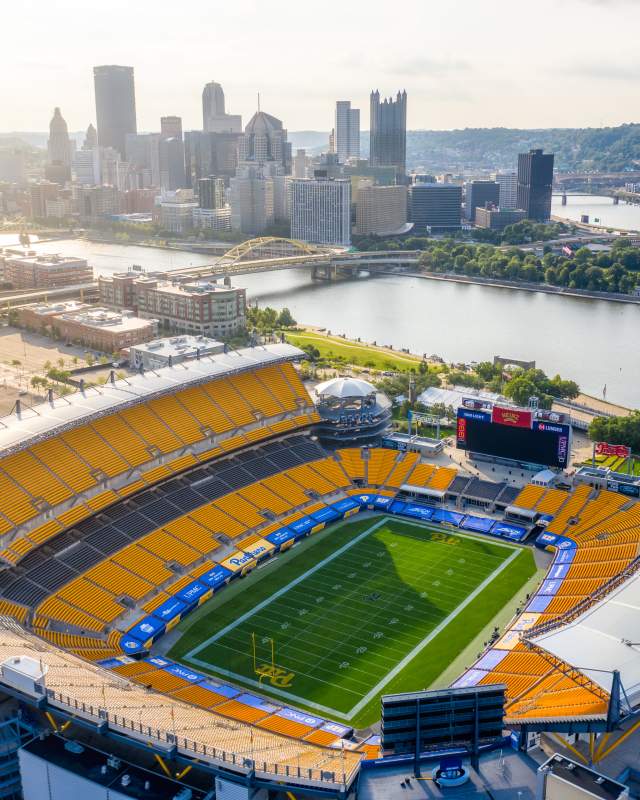 Birds eye view of Acrisure Stadium in Pittsburgh with the skyline in the background
