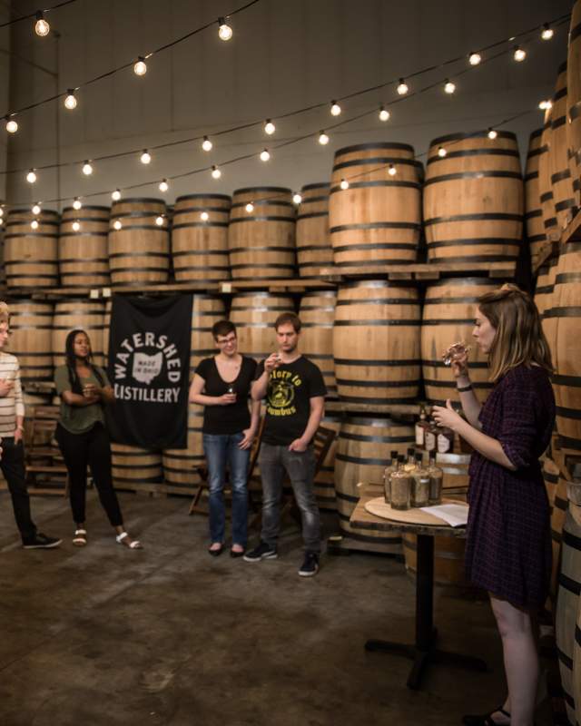 Group on tour at Watershed Distillery