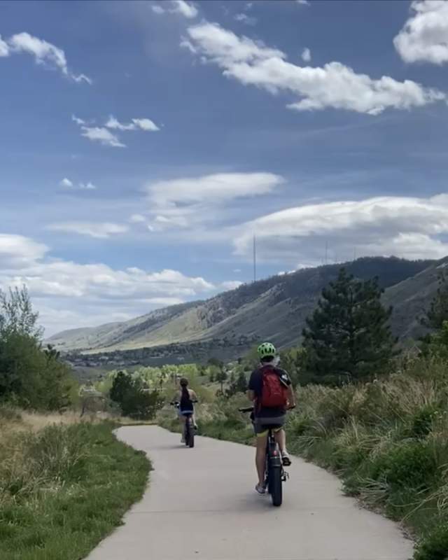 Two people riding E-Bikes in Golden, Colorado