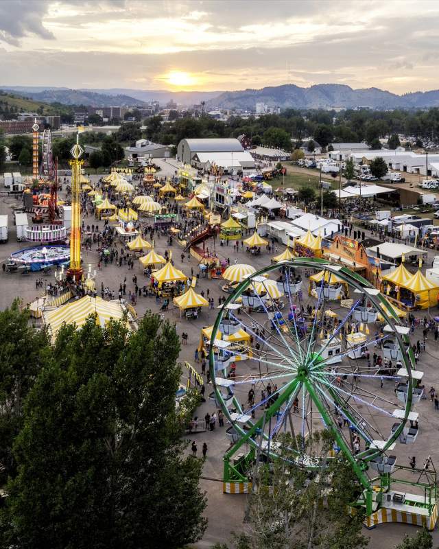 drone view of the central states fair in rapid city with black hills in the background