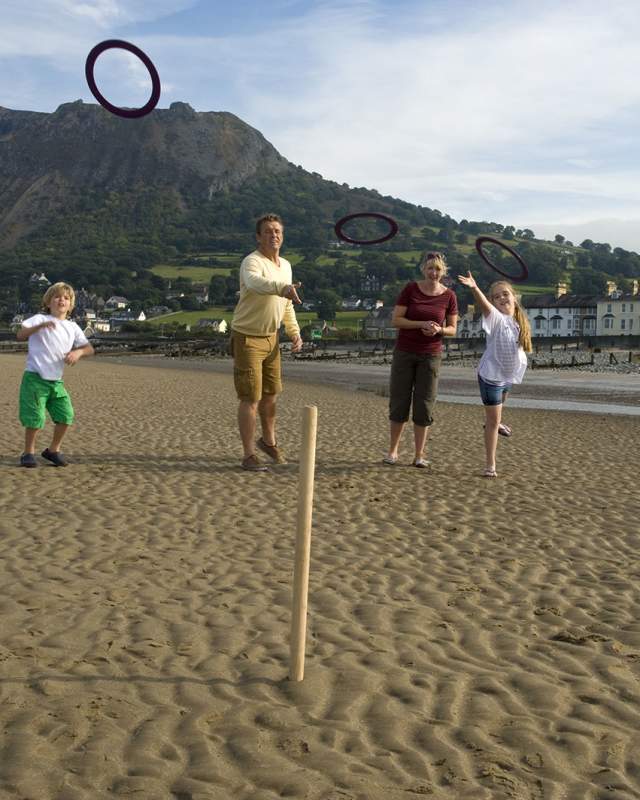 Family enjoying the beach in Llafairfechan