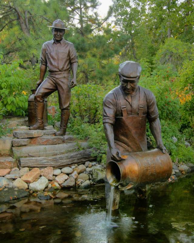 Statues in a pond at the D.C. Booth National Fish Hatchery