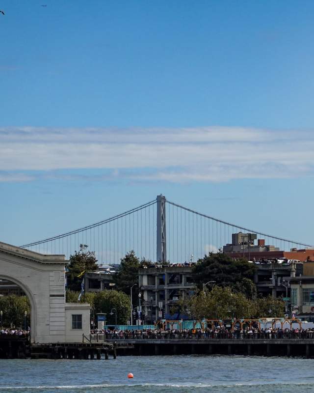 Fisherman's Wharf Promenade along San Francisco city skyline