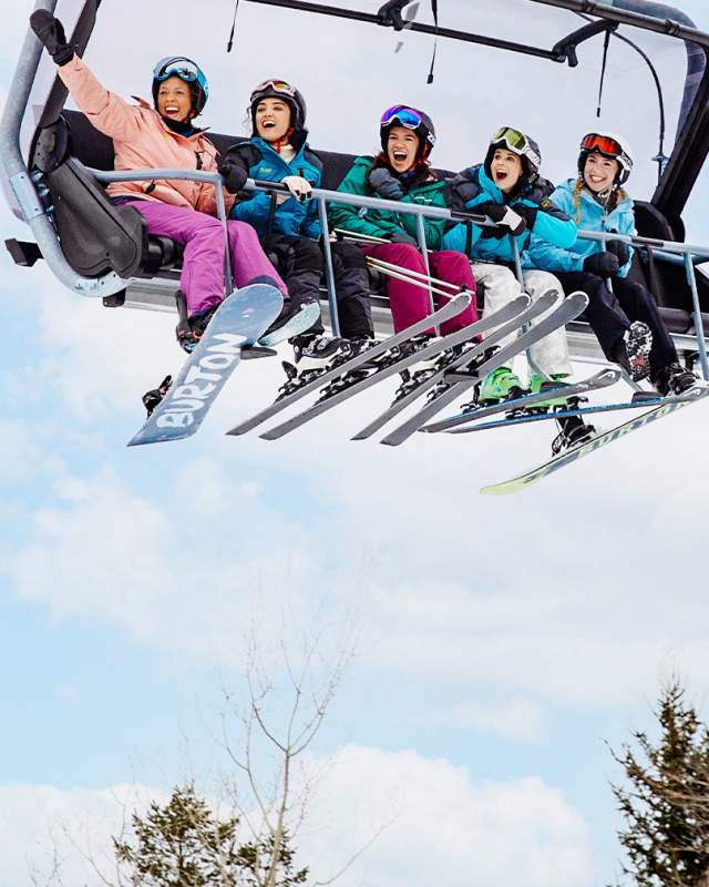 People with snowboard equipment