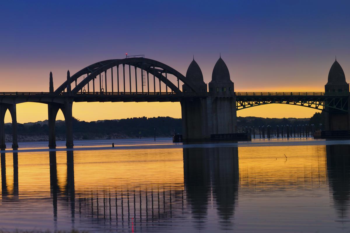 Siuslaw River Bridge at Sunset by Stephanie Ames