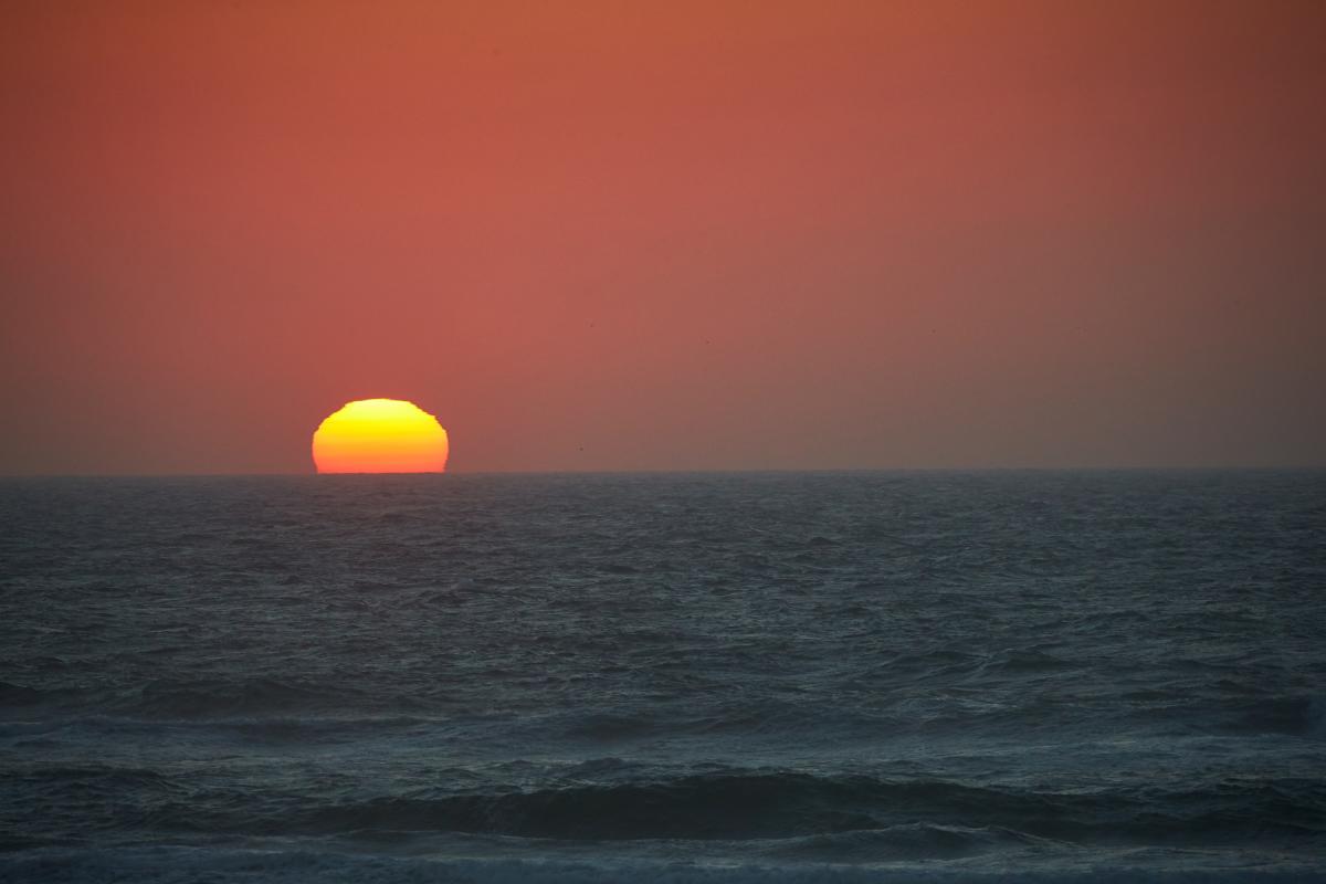 Sunset on the ocean by Jacob Pace