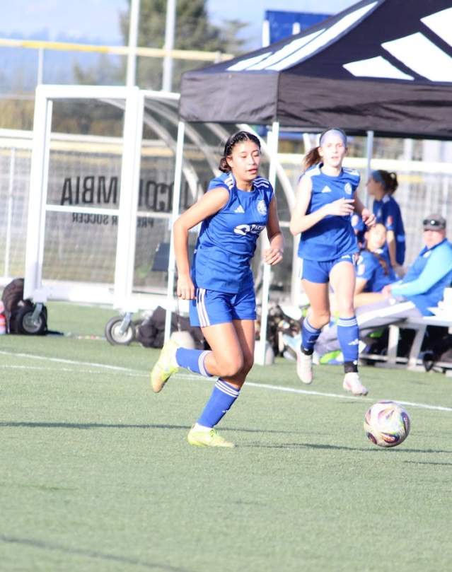 Young girls playing soccer