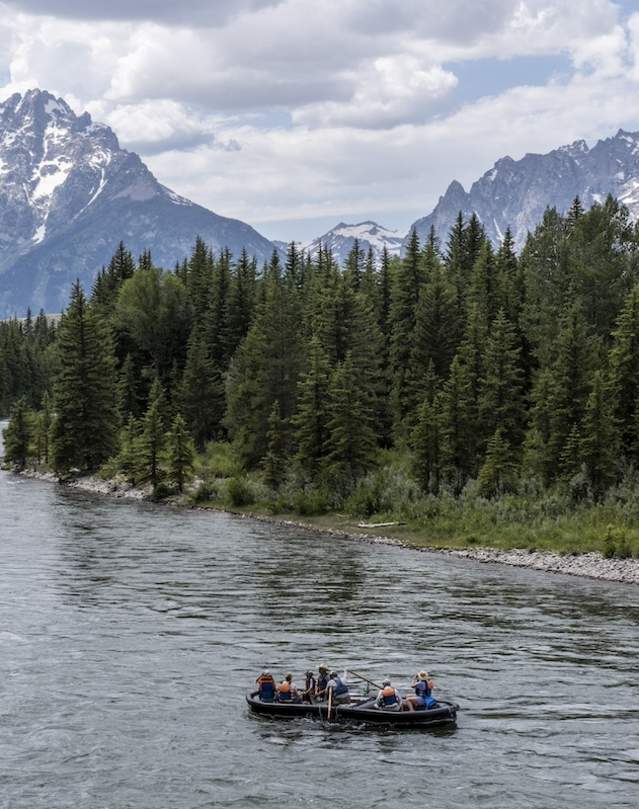 Barker Ewing Float in front of Tetons