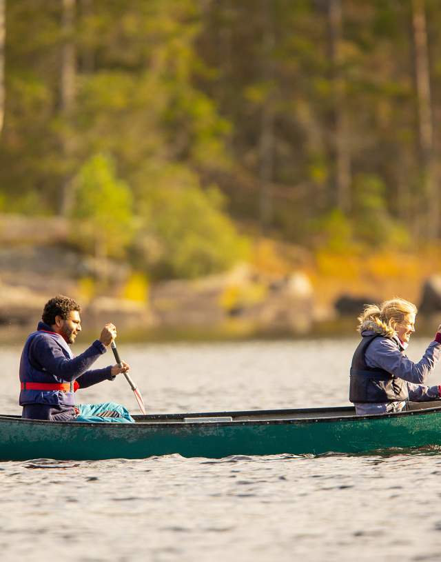 Man and woman canoeing on Børtevann in Sarpsborg, Østfold.