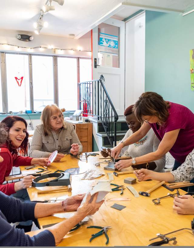 Group enjoys jewelry making class at The Watchmaker's Daughter