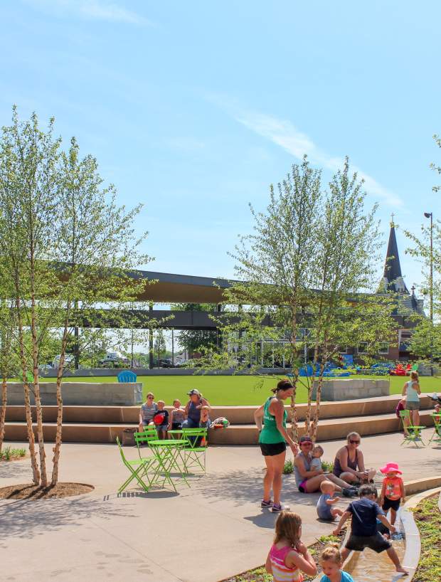 kids playing an a large urban park