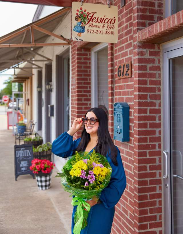 woman with flowers in downtown