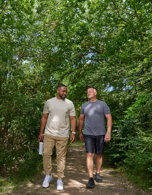 men walking on trail