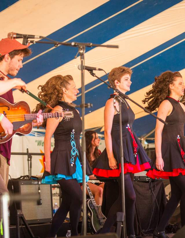 Row of Celtic dancers on stage in Saline