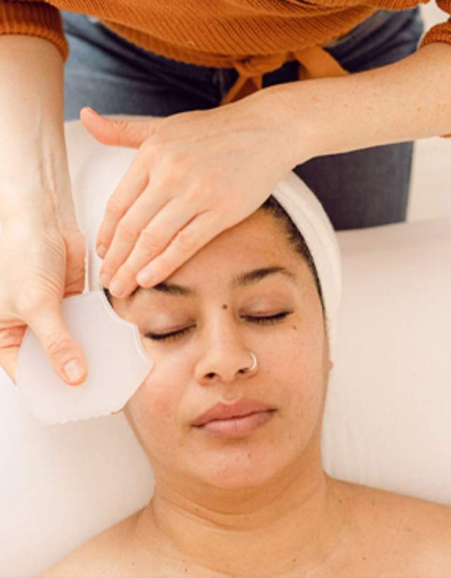 Woman getting a facial at K. West