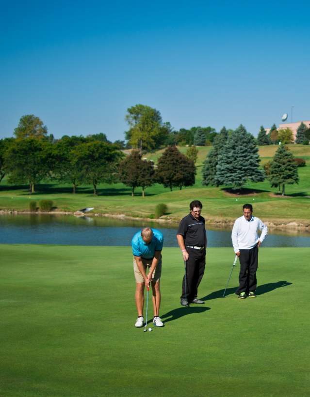 Group of four on green at Eagle Crest
