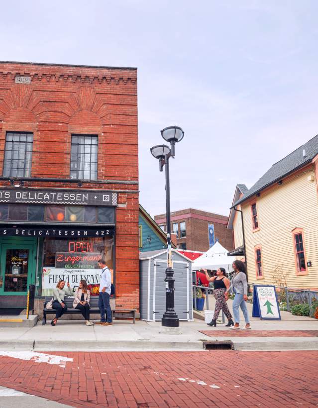 People walking outside Zingerman's Deli