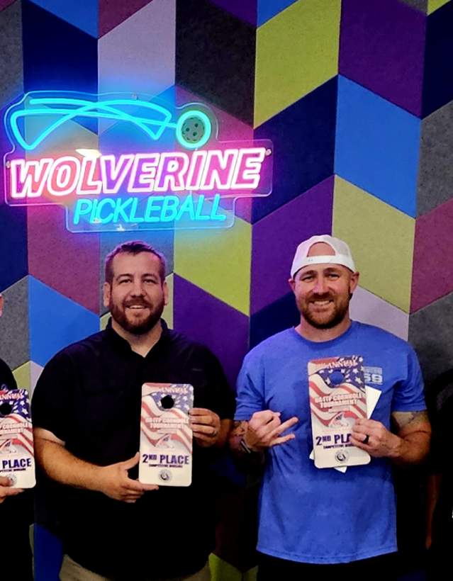 Two groups of UA Cornhole champions