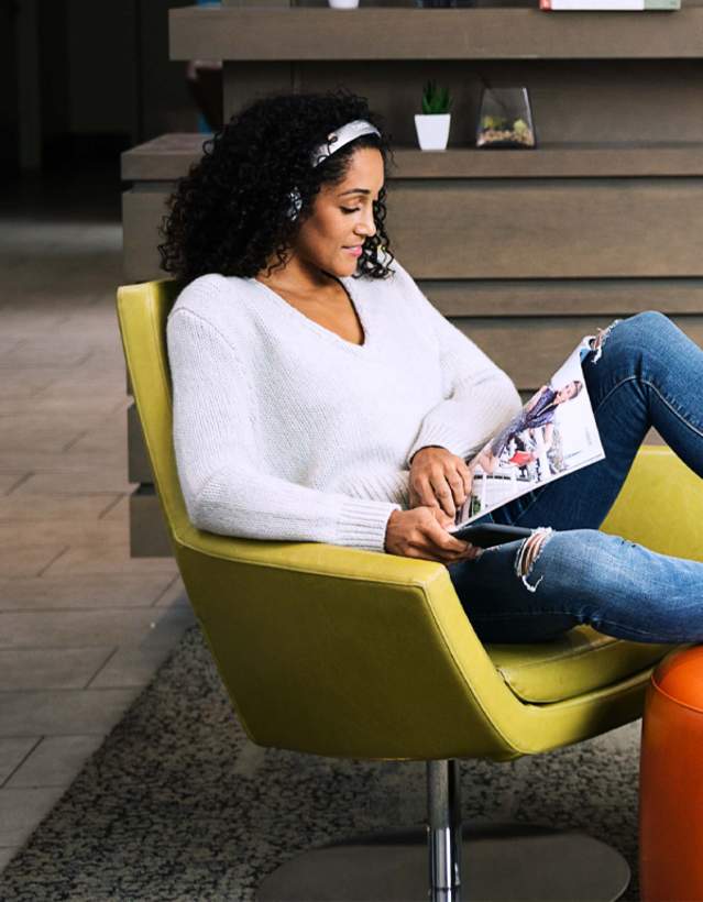 Woman in the lobby of the EVEN Hotel