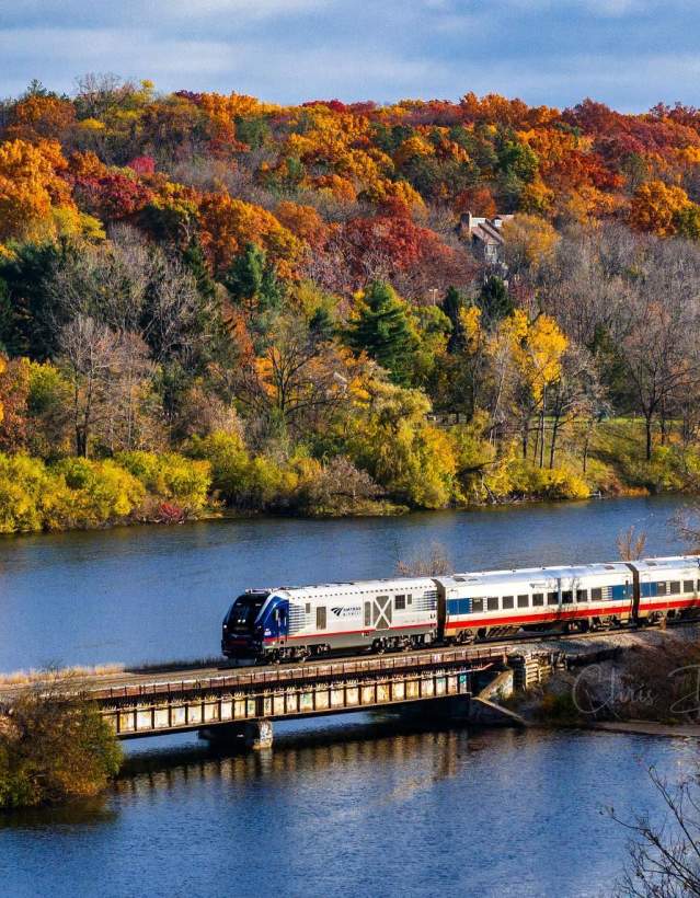 Amtrack Train crossing Huron River in Fall