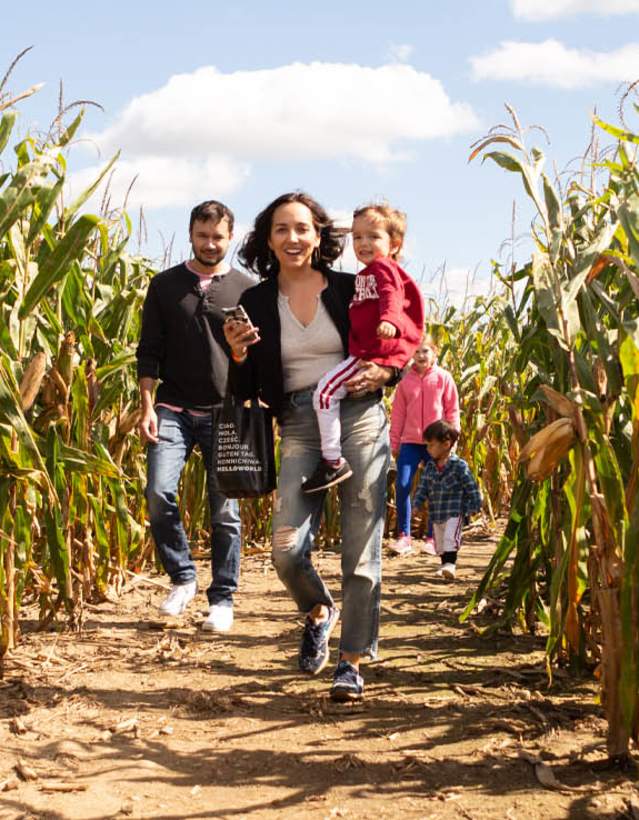 Family in a corn maze in fall