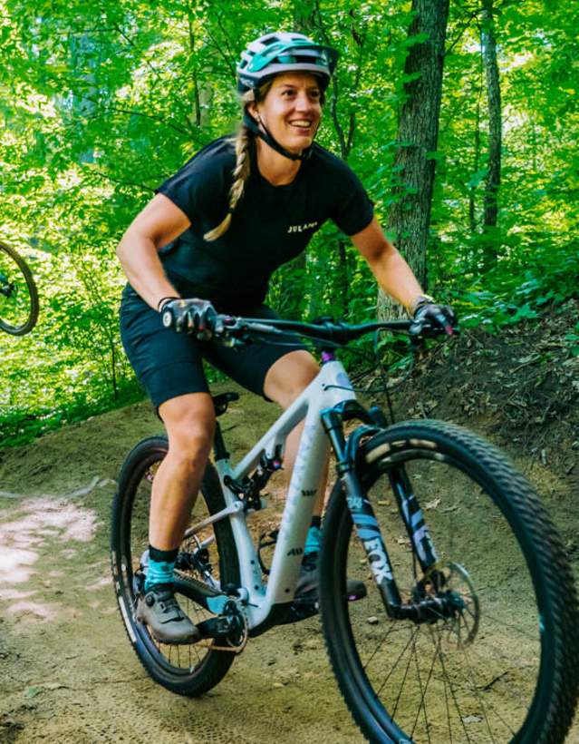 Man and woman mountain biking on DTE Energy Trail
