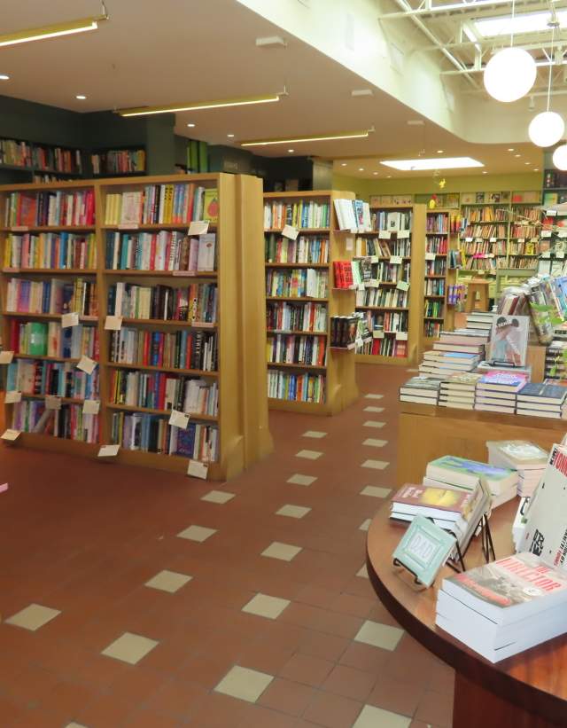 Photo of the First Light Bookstore with shelves filled with books.