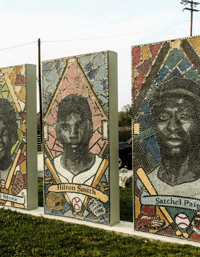 Five large, colorful mosaics of some of Down's Fields most well-known athletes.