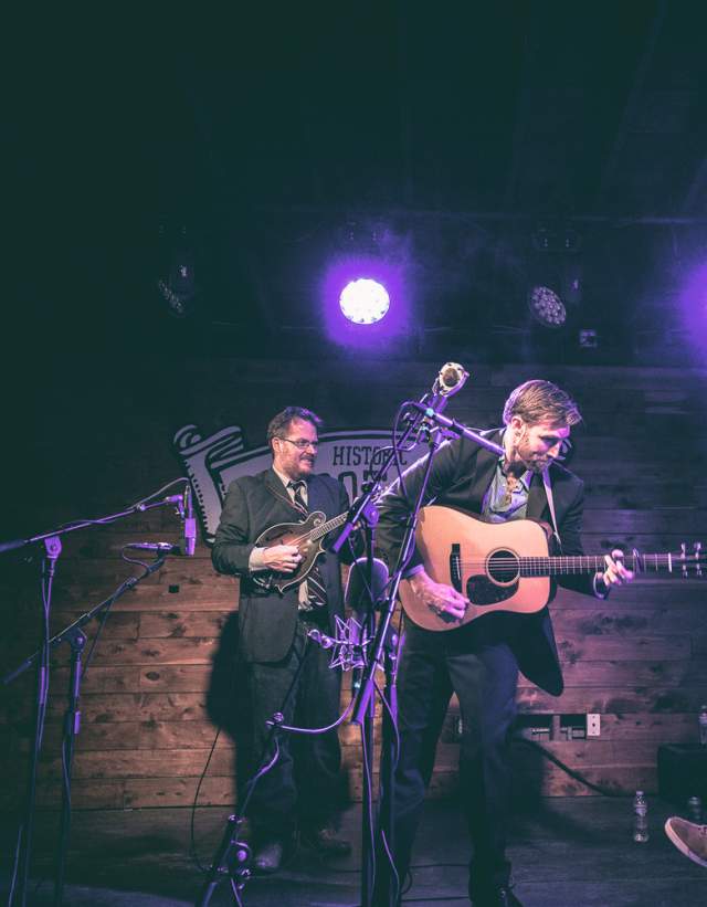 Members of Wood and Wire on stage at Scoot Inn