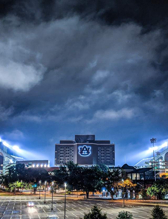 Jordan-Hare Staidum at night with blue tint