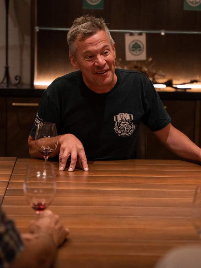 Wine maker Christopher Keys holding a private winetasting