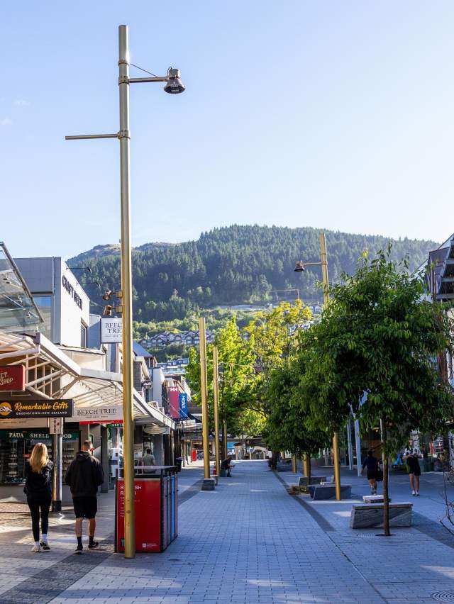 Looking up Beach Street on a bluebird morning with Queenstown Hill in the background