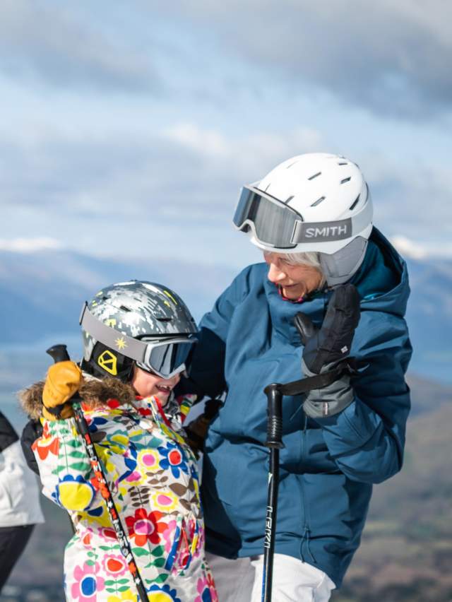 Family skiing at Coronet Peak