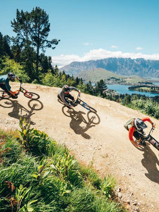 Three friends riding Skyline Queenstown Bike Park