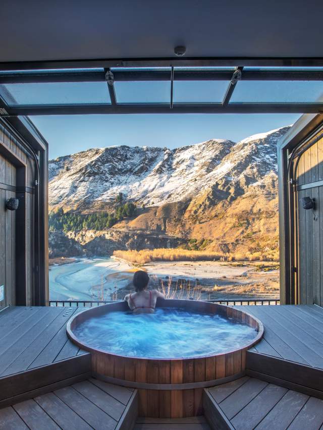 Woman relaxing in Onsen Hot Pools in Winter