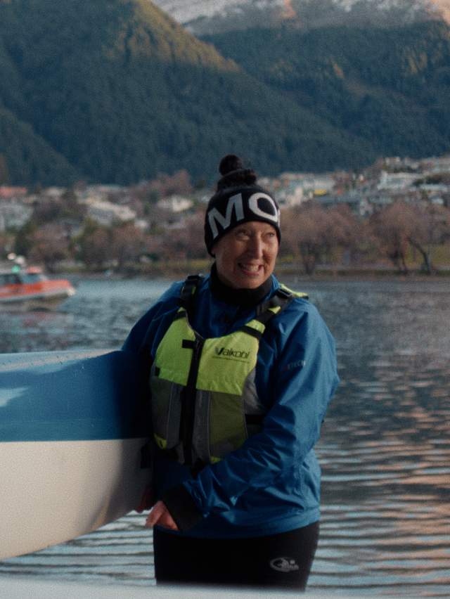 Frances - Waka Ama holding a canoe