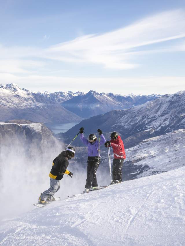 Three Friends Skiing Coronet Peak