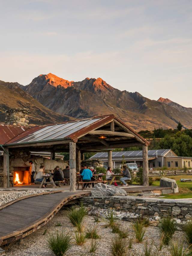 The Headwaters Eco Lodge outside shot at sunset