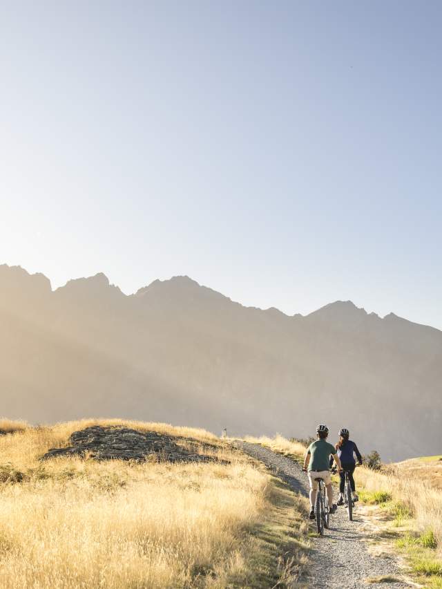 Couple Biking Along Jack's Point Trail