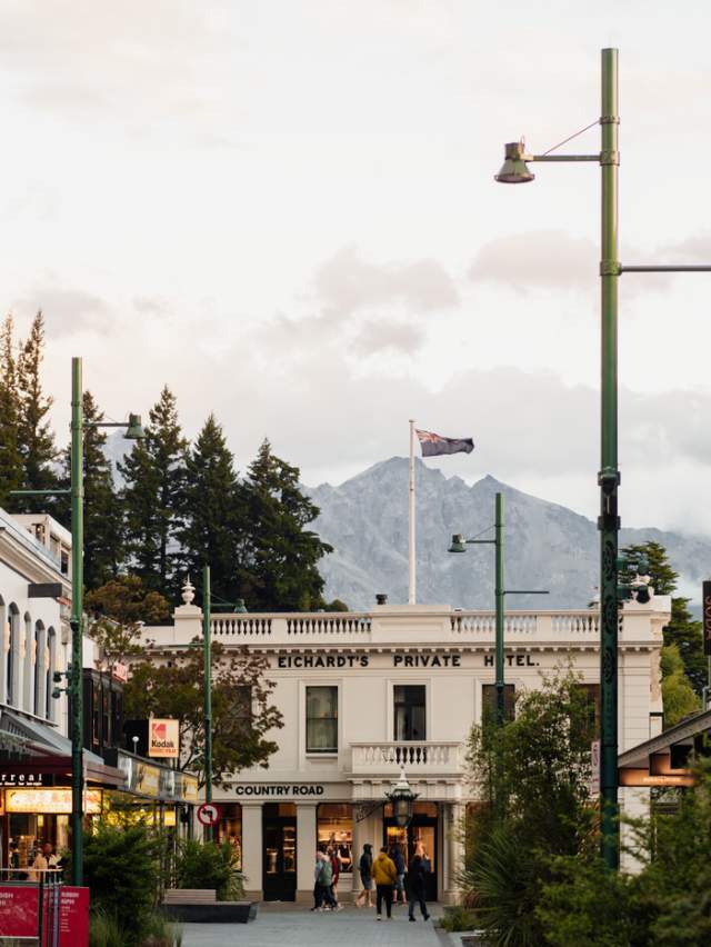 Queenstown down town at dusk with veiws of The Remarkables in the distance