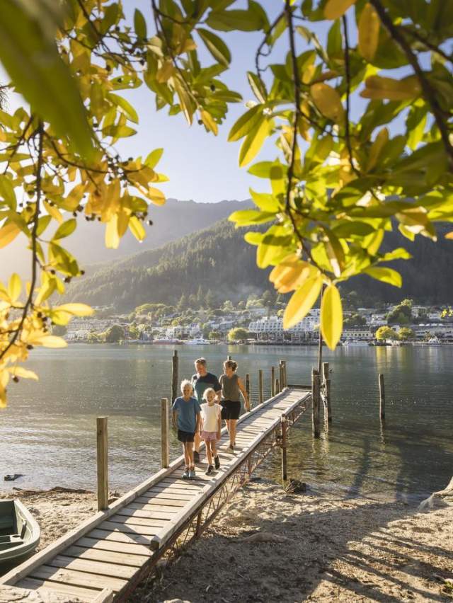 Family walking on pier